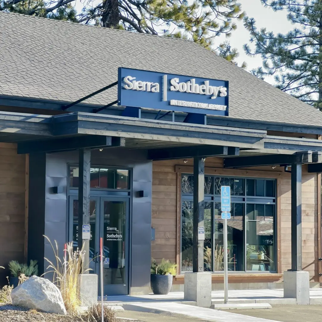 A store front with a sign that says sierra sotheby 's.